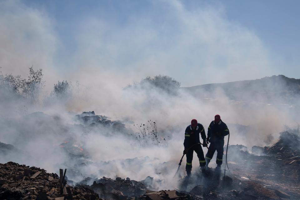 Firefighters try to extinguish the fire burning in Koropi suburb in the eastern part of Athens on Wednesday (Copyright 2024 The Associated Press. All rights reserved)