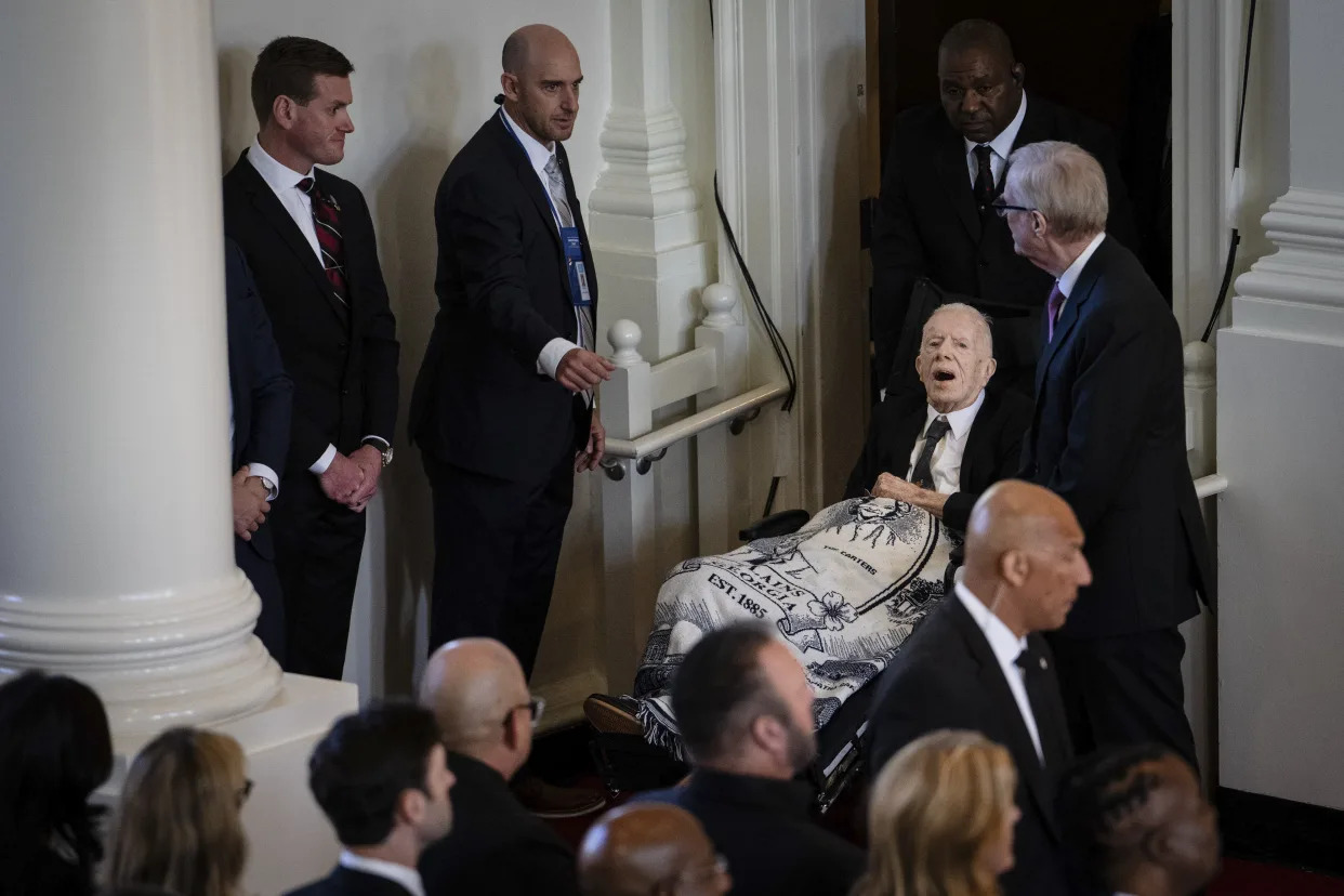 Former President Jimmy Carter attends the memorial service for his wife, former first lady Rosalynn Carter, at Glenn Memorial Church in Atlanta, Nov. 28, 2023. (Erin Schaff/The New York Times)