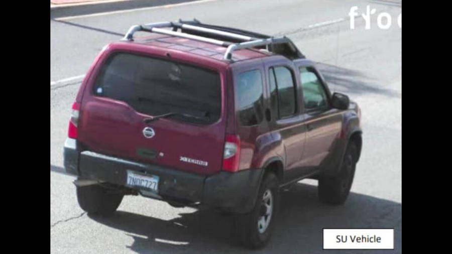 The suspec's vehicle, a red Nissan Xterra SUV with California license plate 7NOC727. (Whittier Police Department)