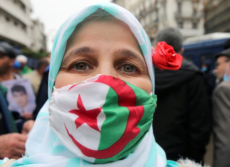 FILE PHOTO: Demonstrators take part in a protest in Algiers