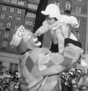 <p>Finger tip on nose of Coco, the clown, one-year old Edgar (last name not available), a patient at Bellevue Hospital in New York, gets into the swing of things as members of the Ringling Brothers Barnum and Bailey Circus entertain the youngsters on April 29, 1956. (AP Photo) </p>