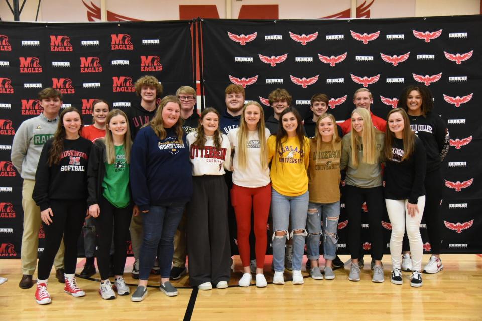 Milford High School celebrated National Signing Day with a ceremony Feb. 2. Athletes signing their letters of intent to play college sports were, from left: Front: Taylor Stemmerding, Muskingum University softball; Jessica Shay, York College golf, Kendall Slusher, Franklin College golf; Gillian Roeder, Otterbein University lacrosse; Lyric Birkley, Bridgewater College soccer; Landen Gooley, Ashland University soccer; Sophie Wohl, Anderson University (SC) soccer; Bry Hendry, Warner University soccer; Kaitlyn Bibb, Muskingum University softball; back: Adam Horn, Wright State University golf; Abbey Sauers, Lake Forest College swimming; Chase Duesing, University of Indianapolis football; Logan Bartholomew, West Virginia State University football; Trevor Ings, Butler University football; Ethan Foster, Otterbein University lacrosse; Eli Simones, Goshen College soccer; Evan Fentress, The Ohio State University swimming; and Olivia Gentry, Springfield College volleyball.