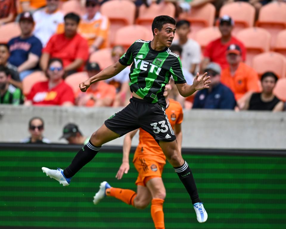 Austin FC midfielder Owen Wolff vies for a ball during the team's 2-1 win over Houston Dynamo FC on April 30. Wolff, 17, has mainly been used as a substitute this season.