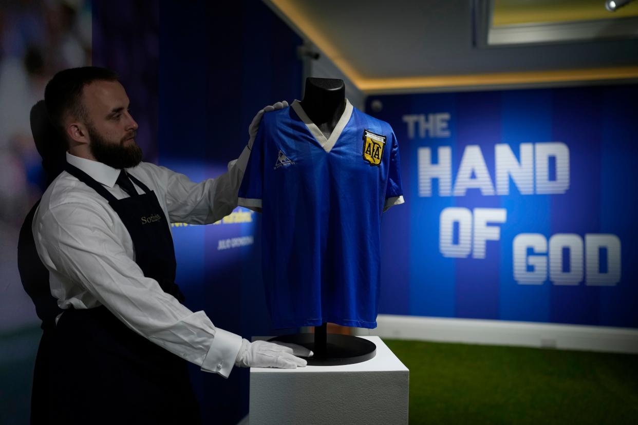 The Diego Maradona jersey is displayed for photographs at Sotheby's auction house in London on April 20, 2022. 