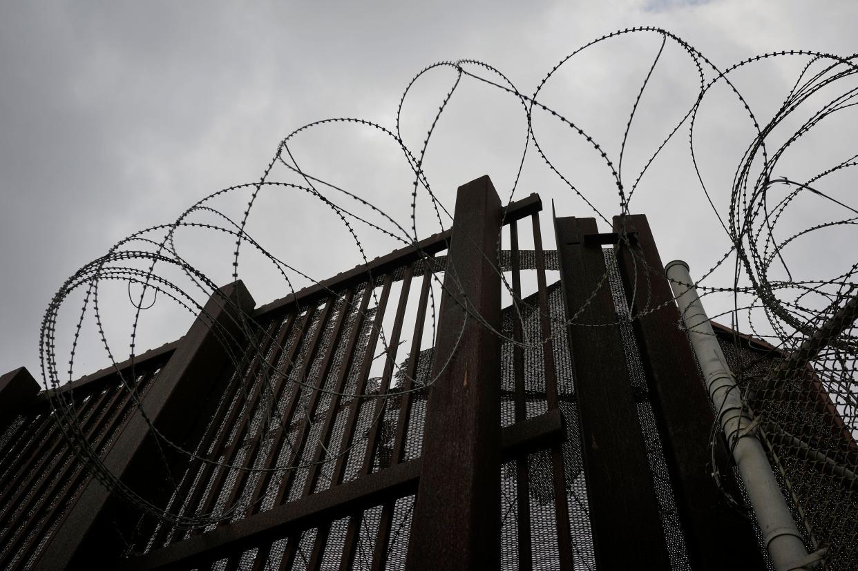 Concertina wire is attached to the border wall in Brownsville Wednesday February 28, 2024.