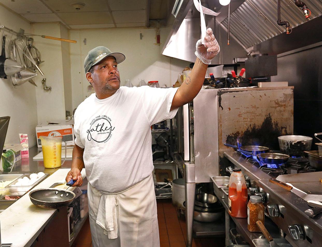 Shelton Perkins fills an order at Gather when it was still located in Pembroke.