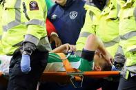 Republic of Ireland defender Seamus Coleman is stretchered off the pitch during the World Cup qualfier against Wales in Dublin on March 24, 2017