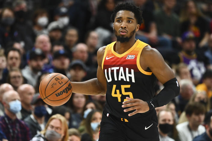 Utah Jazz guard Donovan Mitchell brings the ball up during the first half of the team's NBA basketball game against the New Orleans Pelicans on Saturday, Nov. 27, 2021, in Salt Lake City. (AP Photo/Alex Goodlett)