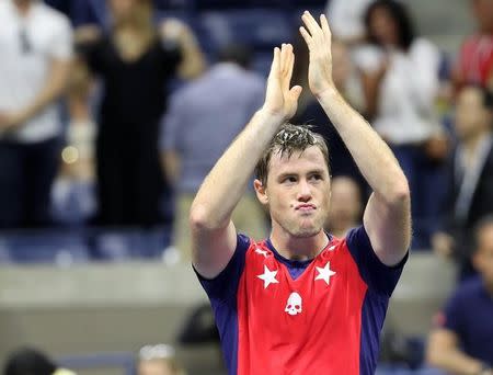 Sep 3, 2016; New York, NY, USA; Ilya Marchenko of Ukraine salutes the crowd after his match against Nick Kyrgios of Australia (not pictured) on day six of the 2016 U.S. Open tennis tournament at USTA Billie Jean King National Tennis Center. Kyrgios was injured and was forced to retire from the match, and Marchenko won 6-4, 4-6, 6-1, ret. Mandatory Credit: Geoff Burke-USA TODAY Sports