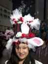 Arielle Dawkins poses for a portrait as she takes part in the annual Easter Bonnet Parade in New York April 20, 2014. REUTERS/Carlo Allegri (UNITED STATES - Tags: SOCIETY RELIGION)