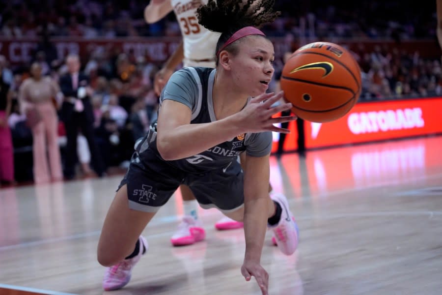 Iowa State guard Arianna Jackson dives for the ball during the first half of an NCAA college basketball game against Texas in Austin, Texas, Saturday, Feb. 17, 2024. (AP Photo/Eric Gay)