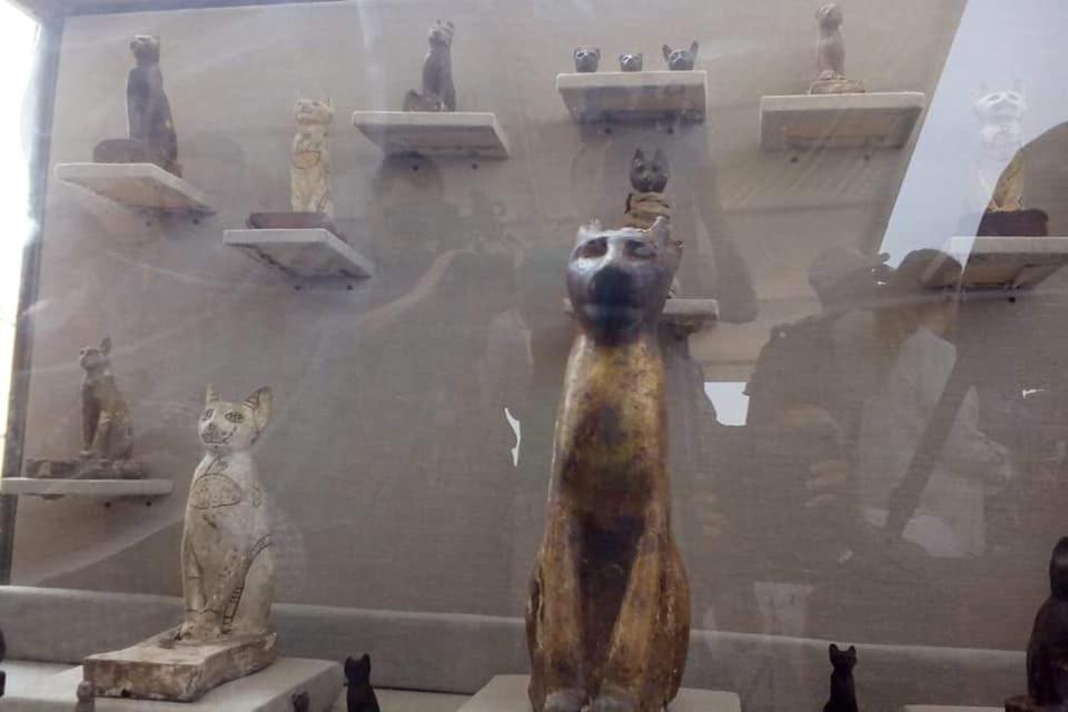 A bronze statue showing Bastet, an Egyptian goddess in the shape of a cat, was discovered along with the cat statues. <cite>Photo courtesy Egyptian Ministry of Antiquities</cite>