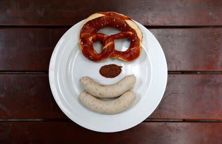 A Bavarian veal sausage is pictured in a Munich beer garden May 17, 2013. REUTERS/Michaela Rehle