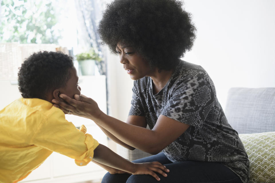 Stock image of a mum and her child having a serious conversation. (Getty Images)