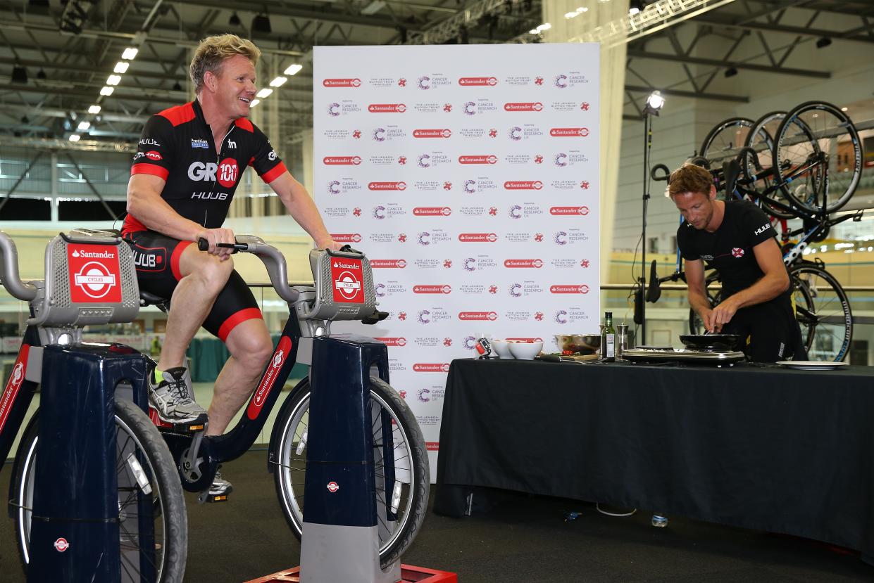 Jenson Button and Gordon Ramsay promote the Jenson Button Trust Triathlon on Santander Cycles at the Derby Arena on July 11, 2015 in Derby, England. (Photo by Chris Brunskill/Getty Images for Santander)