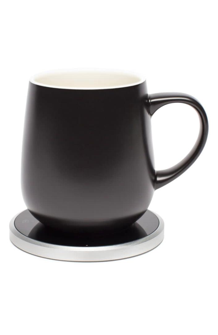 <p>This <span>Ohom Kopi Mug &amp; Warmer Set</span> ($88) will make sure their coffee stays warm all day long. It's a perfect present.</p>