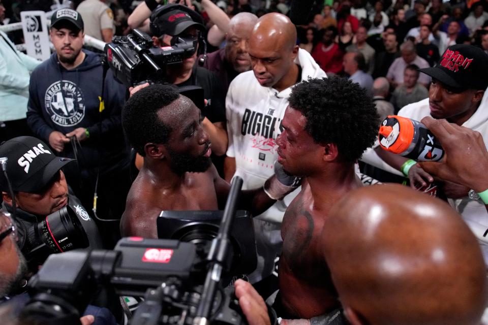 Terence Crawford consoles Errol Spence Jr after the fight (AP)