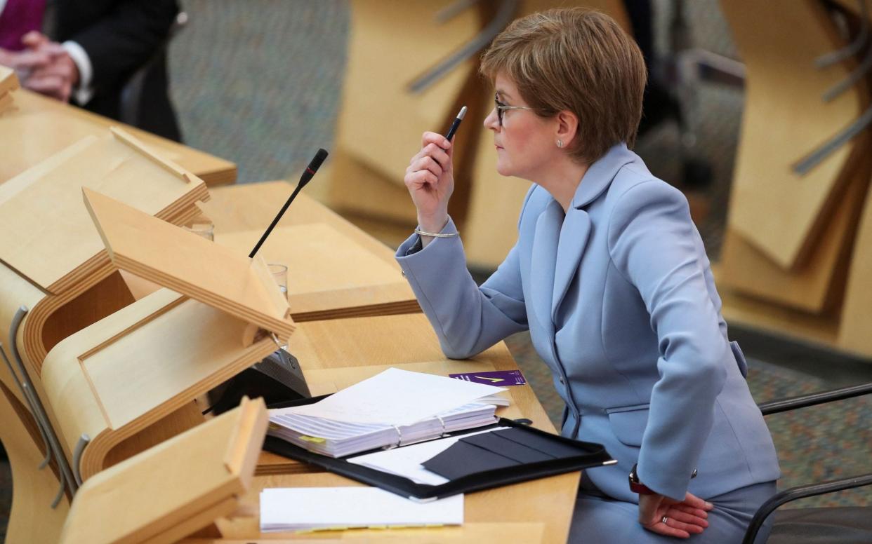 Nicola Sturgeon has previously warned that reducing restrictions may not be possible in some areas - Russell Cheyne/AFP