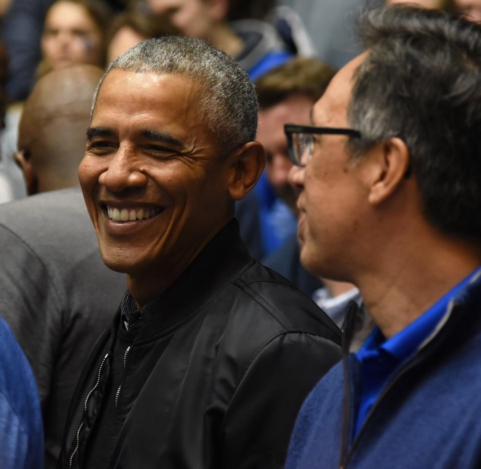 Former President Barack Obama looks on during the first half between the Duke Blue Devils and North Carolina Tar Heels at Cameron Indoor Stadium on February 20, 2019.