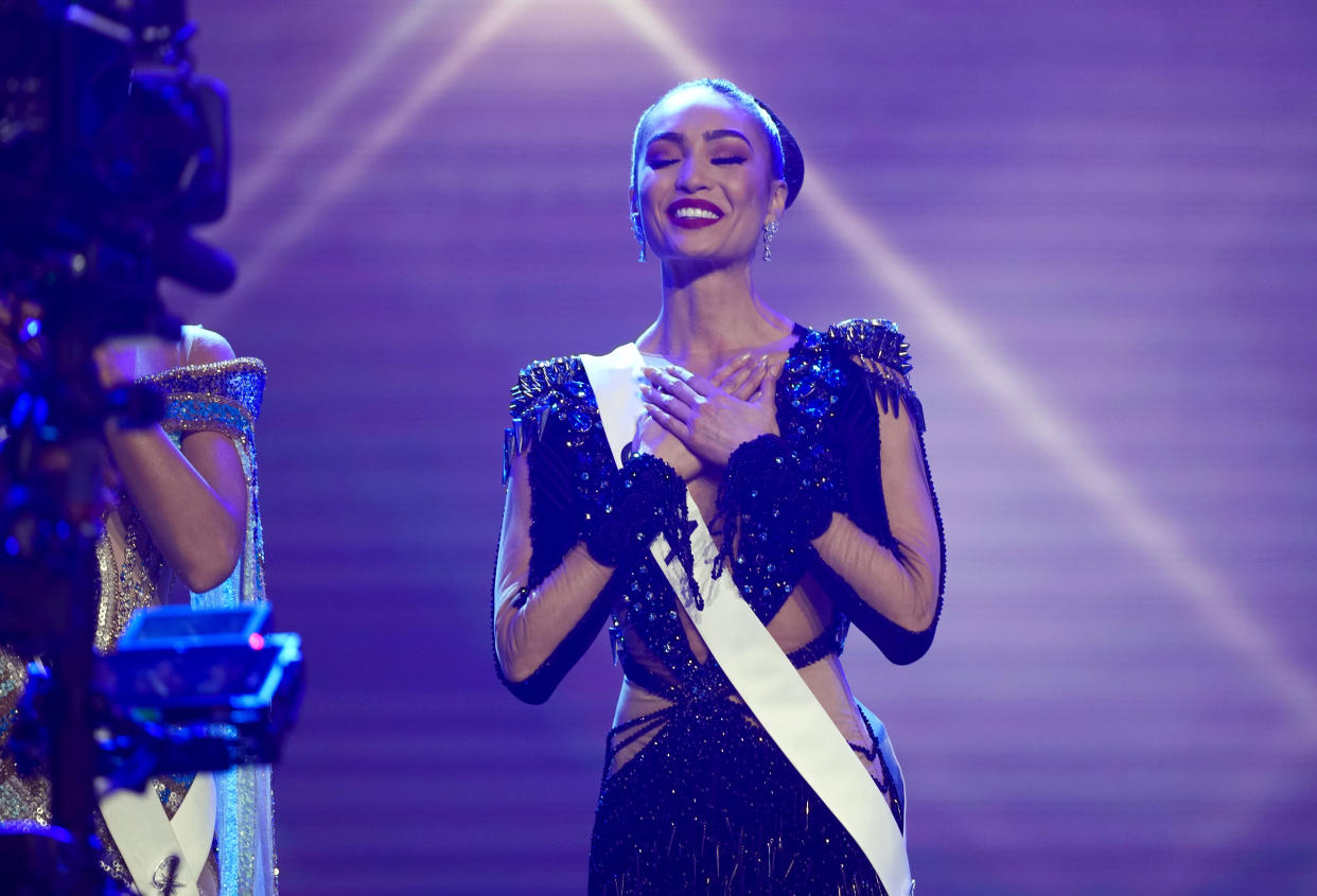 Miss USA R'Bonney Gabriel reacts after being selected as one of the final three contestants in the final round of the 71st Miss Universe Beauty Pageant in New Orleans, Saturday, Jan. 14, 2023. (AP Photo/Gerald Herbert)