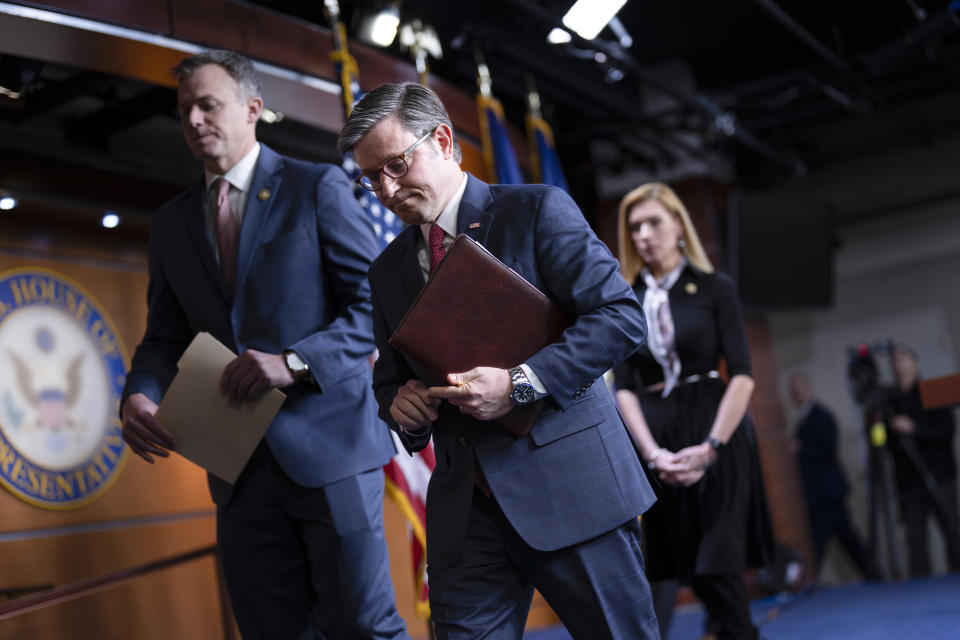 Speaker of the House Mike Johnson, R-La., departs a news conference, joined by Rep. Blake Moore, R-Utah, left, and Rep. Beth Van Duyne, R-Texas, after they discussed President Joe Biden for his policies at the Mexican border during a news conference at the Capitol in Washington, Thursday, Feb. 29, 2024. (AP Photo/J. Scott Applewhite)