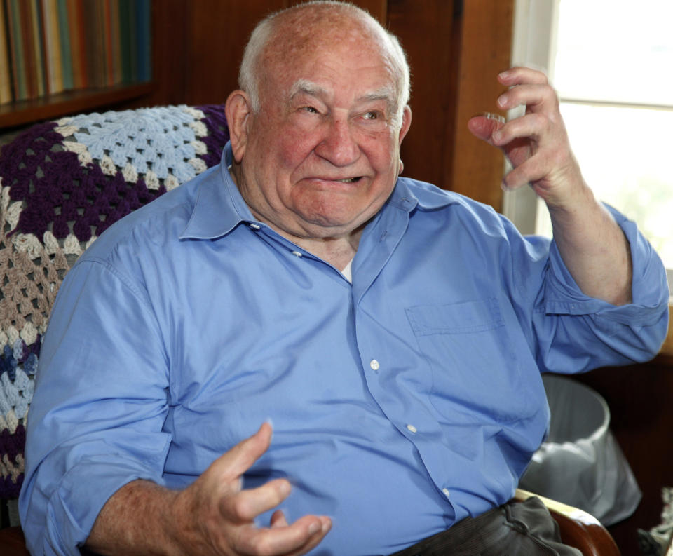 FILE - In this May 6, 2009, file photo, actor Ed Asner jokes as he grimaces at his home in Valley Village neighborhood in Los Angeles. Asner, the blustery but lovable Lou Grant in two successful television series, has died. He was 91. Asner's representative confirmed the death in an email Sunday, Aug. 29, 2021, to The Associated Press. (AP Photo/Damian Dovarganes, File)