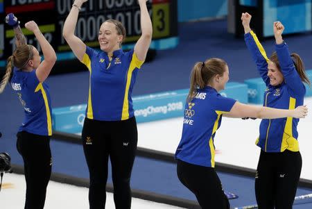 Curling - Pyeongchang 2018 Winter Olympics - Women's Final - Sweden v South Korea - Gangneung Curling Center - Gangneung, South Korea - February 25, 2018 - Sofia Mabergs of Sweden and her teammates, Agnes Knochenhauer, Sara McManus and Anna Hasselborg, celebrate their win. REUTERS/Cathal Mcnaughton