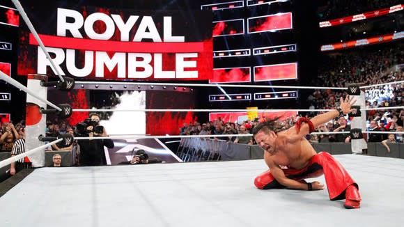 WWE wrestler Shinsuke Nakamura striking a celebratory pose at Royal Rumble 2018.