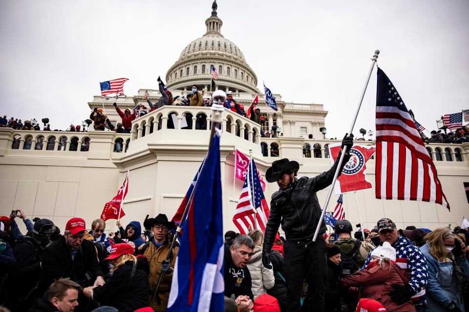 Supporters mass at the U.S. Capitol after a rally led by President Donald Trump on Jan. 6 in Washington, D.C. The demonstration turned violent after rioters rushed the building and forced their way inside.