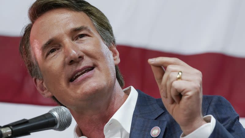 Virginia Gov. Glenn Youngkin speaks prior to signing the budget at a ceremony at a grocery store June 21, 2022, in Richmond, Va. Youngkin is reportedly reconsidering plans to run for president in 2024.