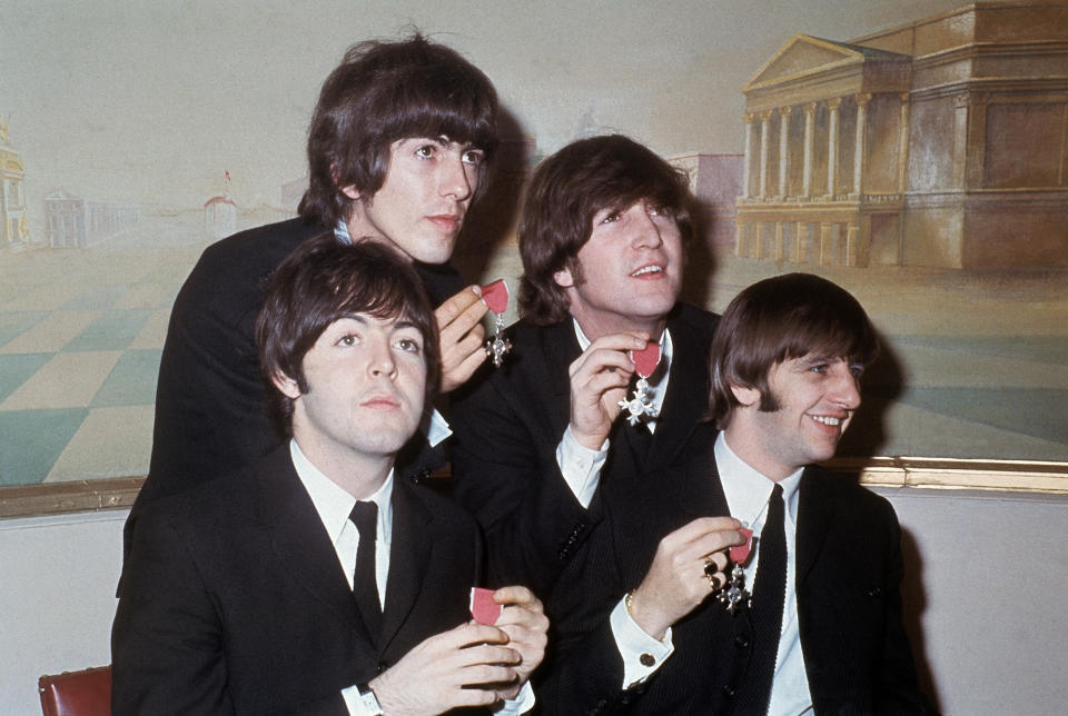 Beatles honored with Member of the Order of the British Empire medals in 1965 (AP)