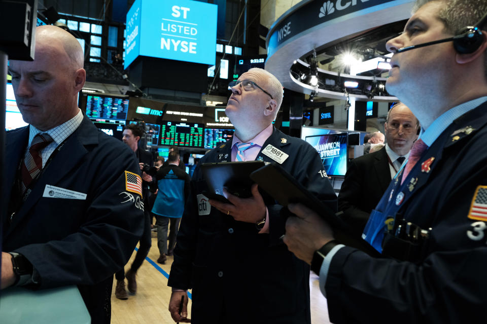 NEW YORK, NEW YORK - MARCH 10: Traders work on the floor of the New York Stock Exchange (NYSE)  on March 10, 2020 in New York City. After losing nearly 8 percent in a market rout yesterday, the Dow Jones Industrial Average was up over 700 points in morning trading as investors look to a possible tax cut and other measures by the Trump administration to combat the coronavirus. (Photo by Spencer Platt/Getty Images)