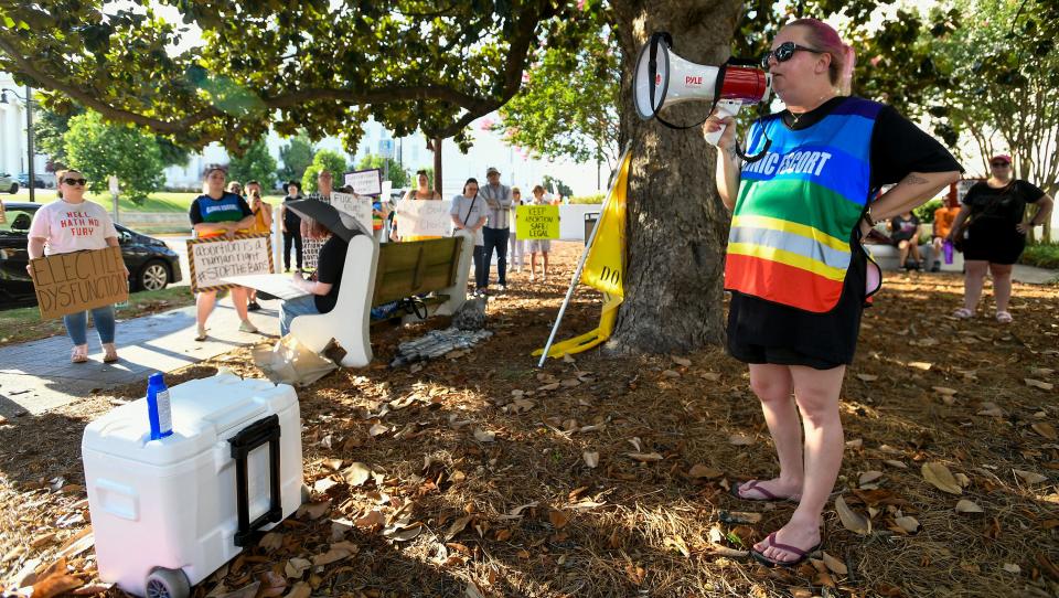 Mia Raven speaks during an abortion rights rally on the grounds of the Alabama Statehouse in Montgomery, Ala., on Friday June 24, 2022. About 100 protestors showed up tp protest the overturning of Roe v Wade by the U.S. Supreme Court.