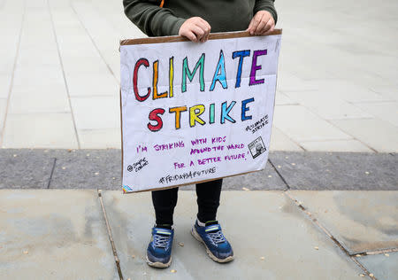 FILE PHOTO: Climate change activist Zayne Cowie attends a youth climate march in New York City, U.S., May 3, 2019. REUTERS/Brendan McDermid