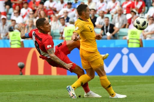 Peru captain Paolo Guerrero scores his team's second goal in their 2-0 win over Australia in Sochi