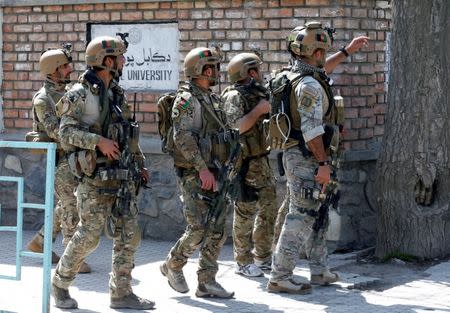 Afghan security forces arrive at the site of a suicide attack in Kabul, Afghanistan March 21, 2018. REUTERS/Omar Sobhani