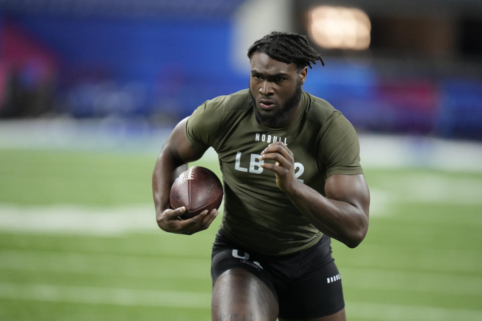Alabama linebacker Will Anderson runs a drill at the NFL football scouting combine in Indianapolis, Thursday, March 2, 2023. (AP Photo/Michael Conroy)
