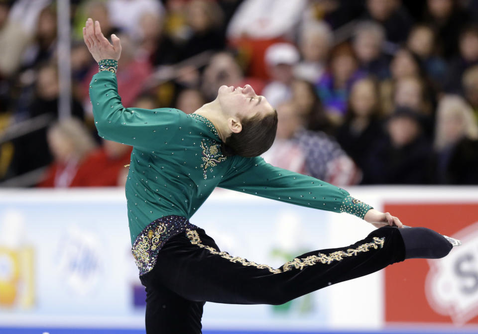 Jason Brown competes during the men's free skate at the U.S. Figure Skating Championships Sunday, Jan. 12, 2014 in Boston. (AP Photo/Steven Senne)