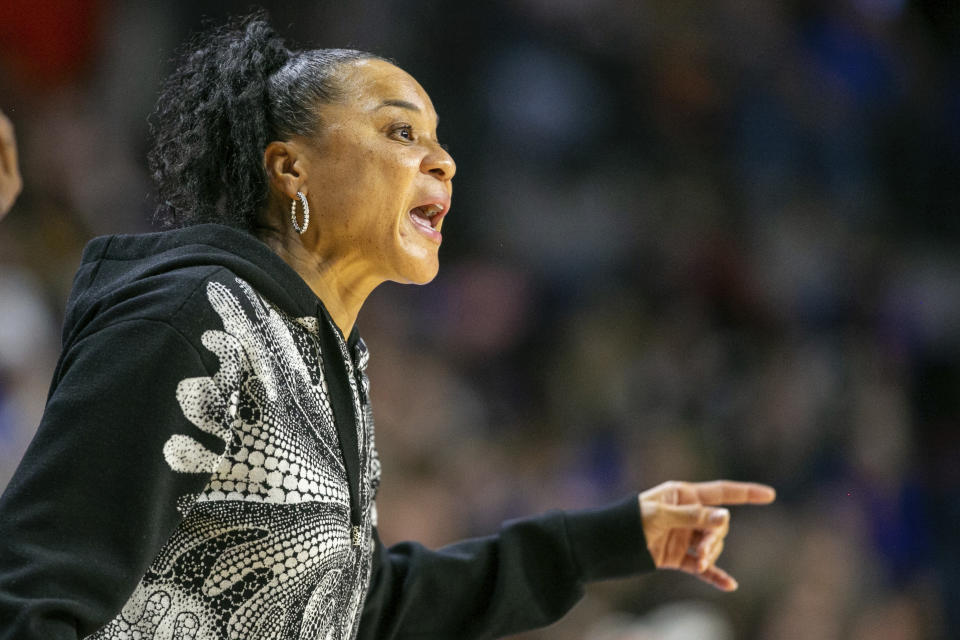 South Carolina head coach Dawn Staley yells from the sideline in the first half of an NCAA college basketball game against Florida, Thursday, Jan. 4, 2024, in Gainesville, Fla. (AP Photo/Alan Youngblood)