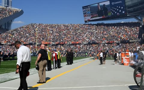 An empty sideline as the players for the Pittsburgh Steelers did not come out for the National Anthem before the game against the Chicago Bears  - Credit: USA Today