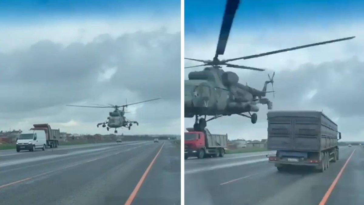 Low-flying Russian military helicopter almost collides with a truck