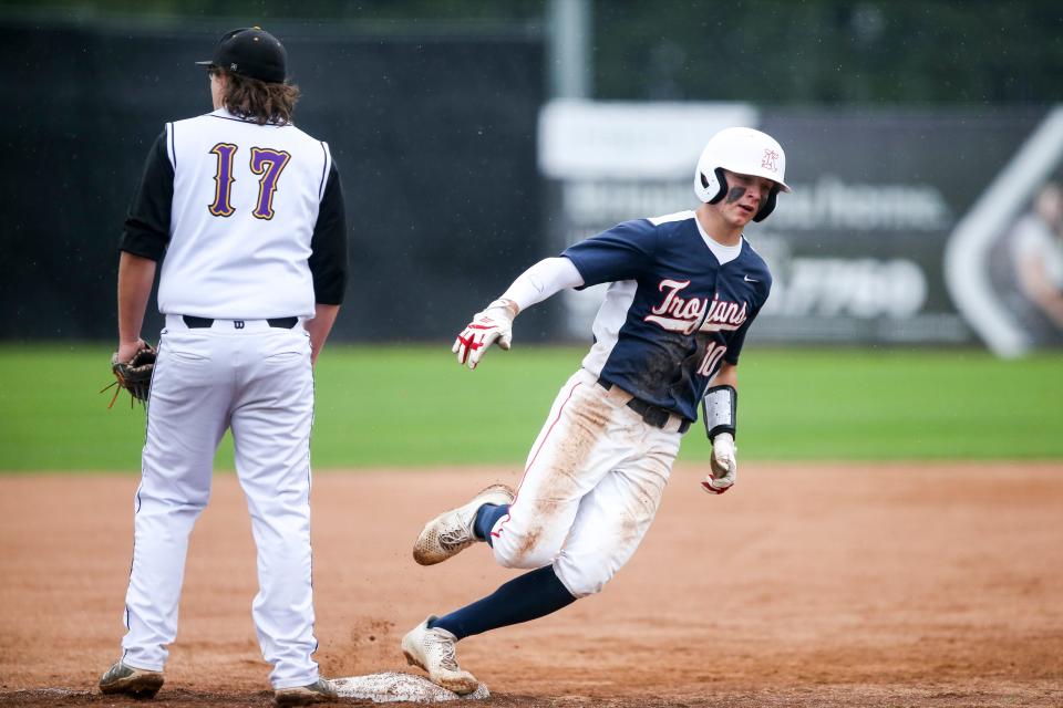 Kennedy's Riley Cantu (10) rounds third base and runs toward home plate during the OSAA 2A/1A state championship against Umpqua Valley Christian on Friday, June 3, 2022, at Volcanoes Stadium in Keizer, Ore.