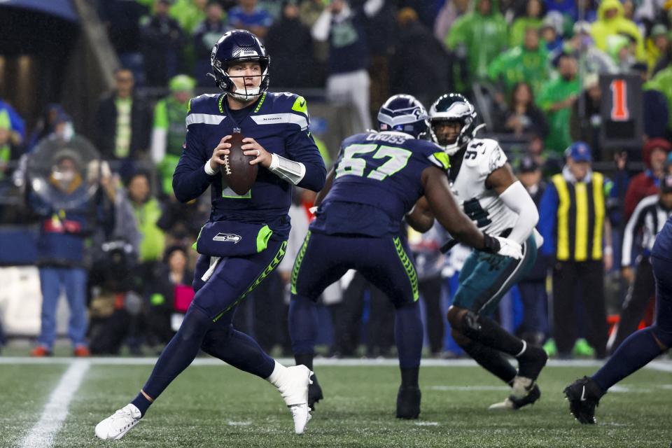 Dec 18, 2023; Seattle, Washington, USA; Seattle Seahawks quarterback Drew Lock (2) looks to pass against the Philadelphia Eagles during the first quarter at Lumen Field. Mandatory Credit: Joe Nicholson-USA TODAY Sports