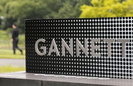 The logo of Gannett Co is seen outside their corporate headquarters in McLean, Virginia, in this file photo taken July 23, 2013. REUTERS/Larry Downing/Files