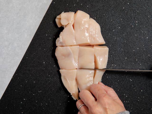 <p>Sara Haas</p> Moore's method of cubing the chicken breast.