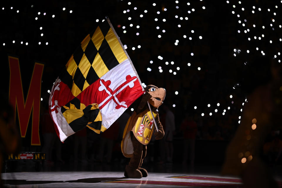 Dec 2, 2022; College Park, Maryland, USA; Maryland Terrapins mascot waves the state flag before the game against Illinois Fighting Illini at Xfinity Center. Credit: Tommy Gilligan-USA TODAY Sports