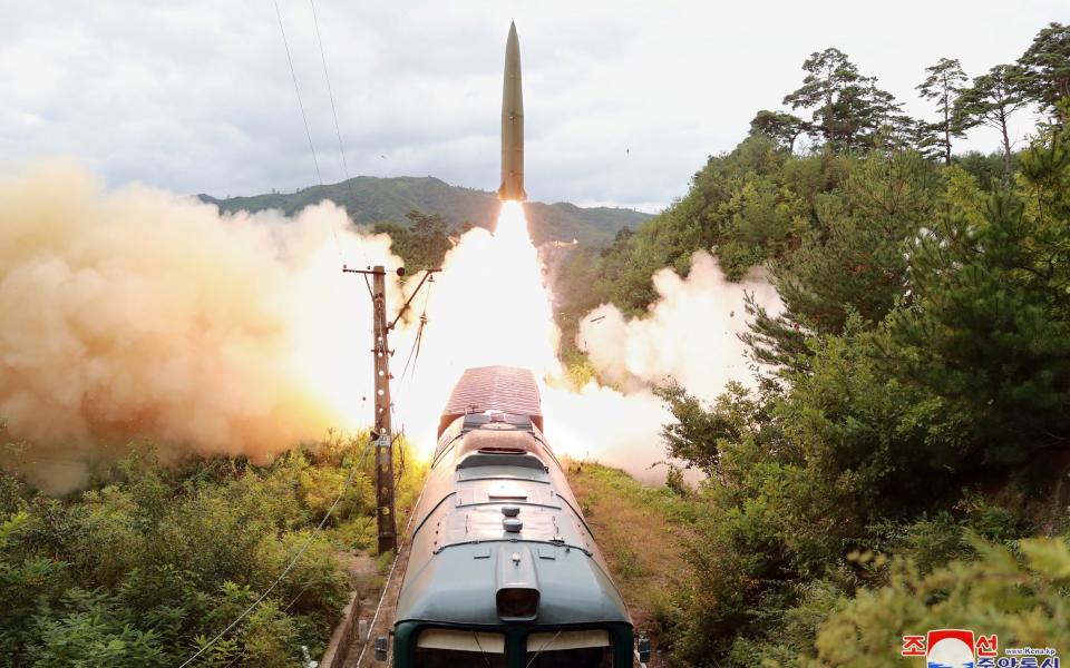 In this image provided by the Korean Central News Agency, a missile appears to launch from the back of a train - KCNA via Reuters