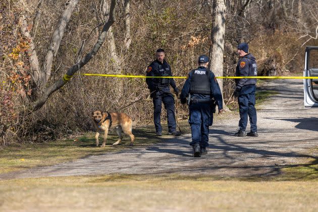 Suffolk County police search Southards Pond Park on March 1 in Babylon, where human remains had been discovered.