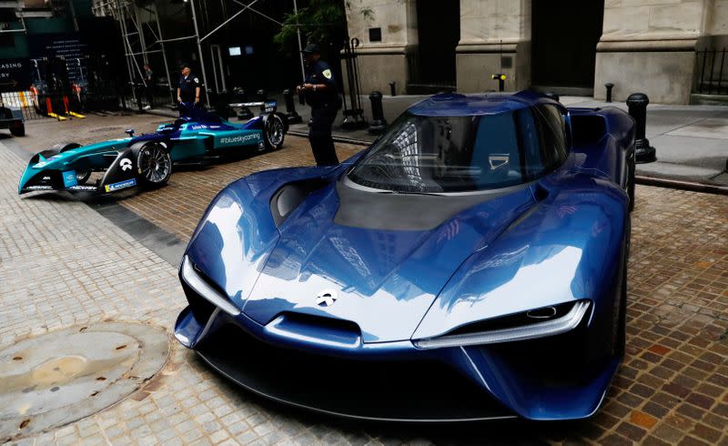 FILE PHOTO: Chinese electric vehicle start-up Nio Inc. vehicles are on display in front of the NYSE to celebrate the company’s IPO in New York