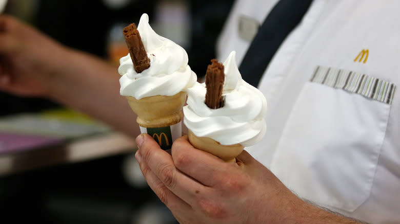 Man holding McDonald's ice creams